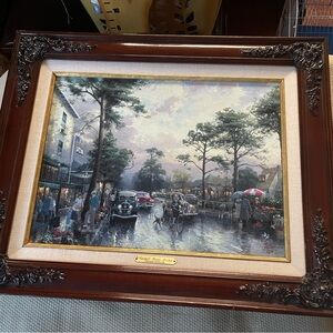 Thomas Kinkade. Carmel, Ocean Avenue on a rainy afternoon